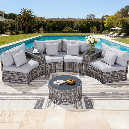 Outdoor patio furniture set with cushions by a pool