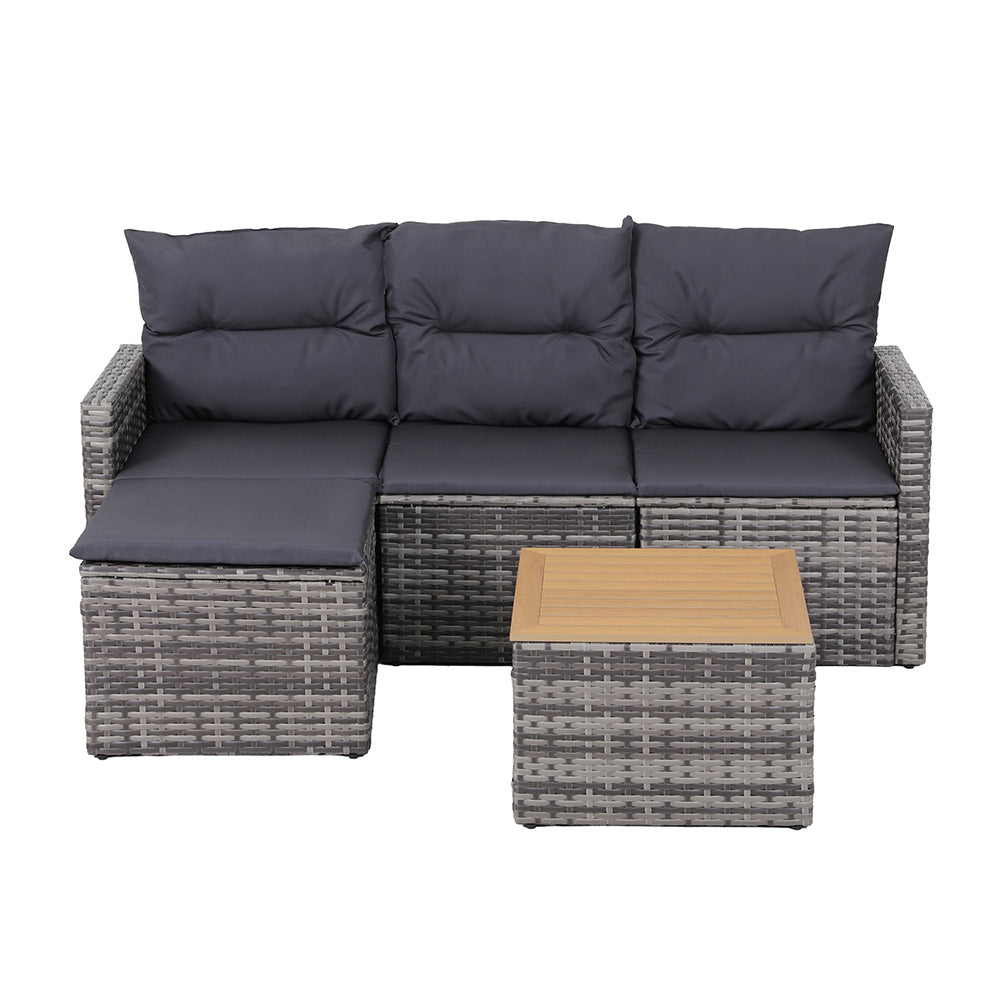Outdoor furniture set with gray cushions and a wooden table on a white background