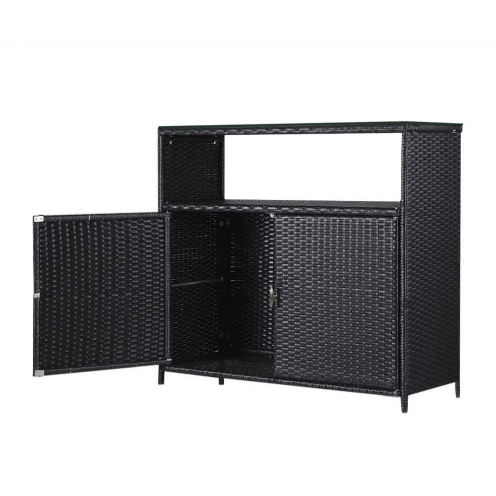 Black wicker sideboard with open doors on a white background