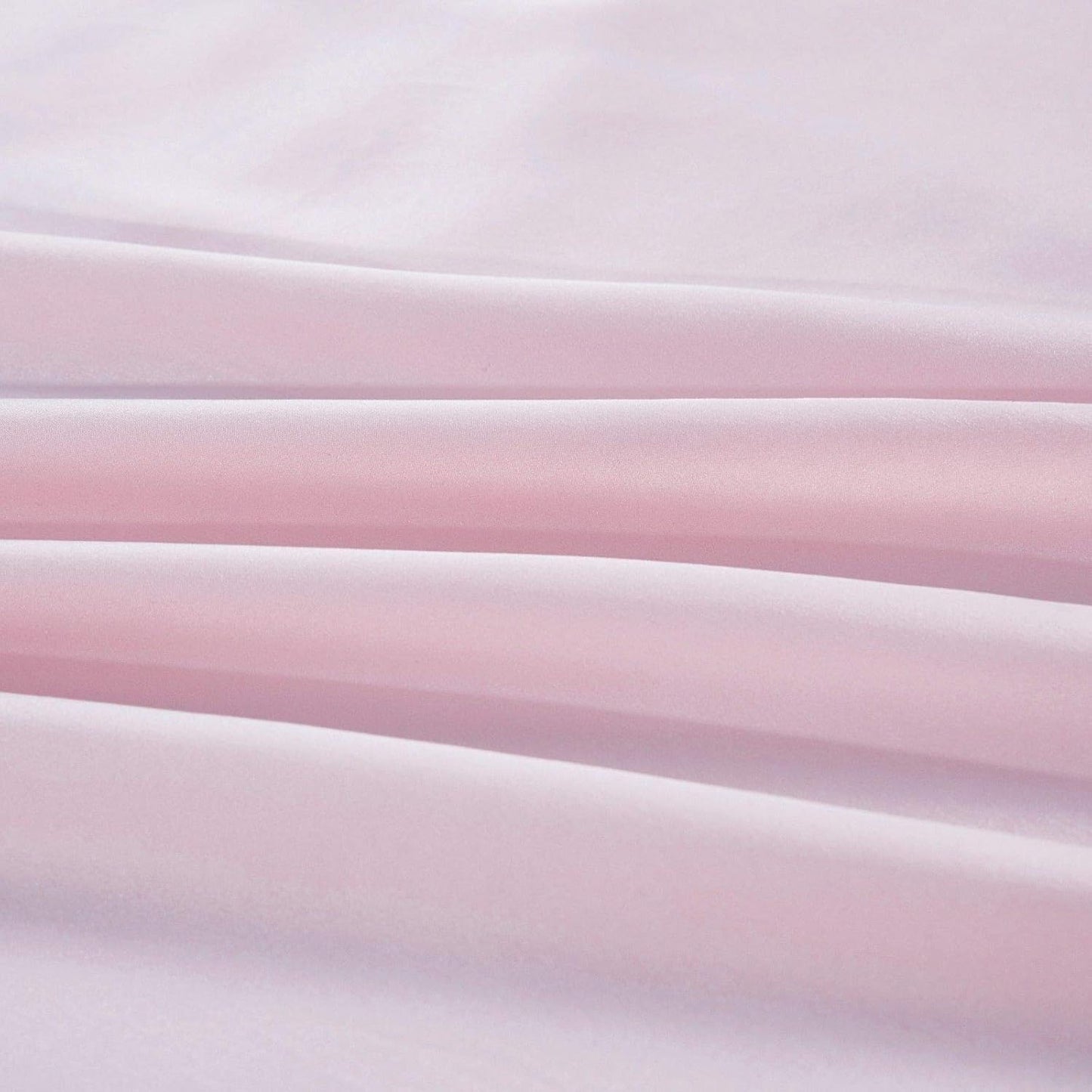 Stack of pink fabric swatches with gradient effect