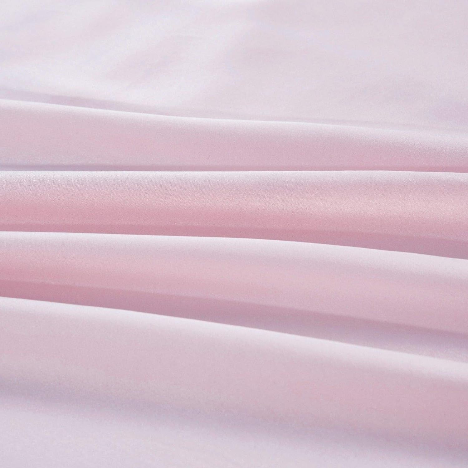 Stack of pink fabric swatches with gradient effect